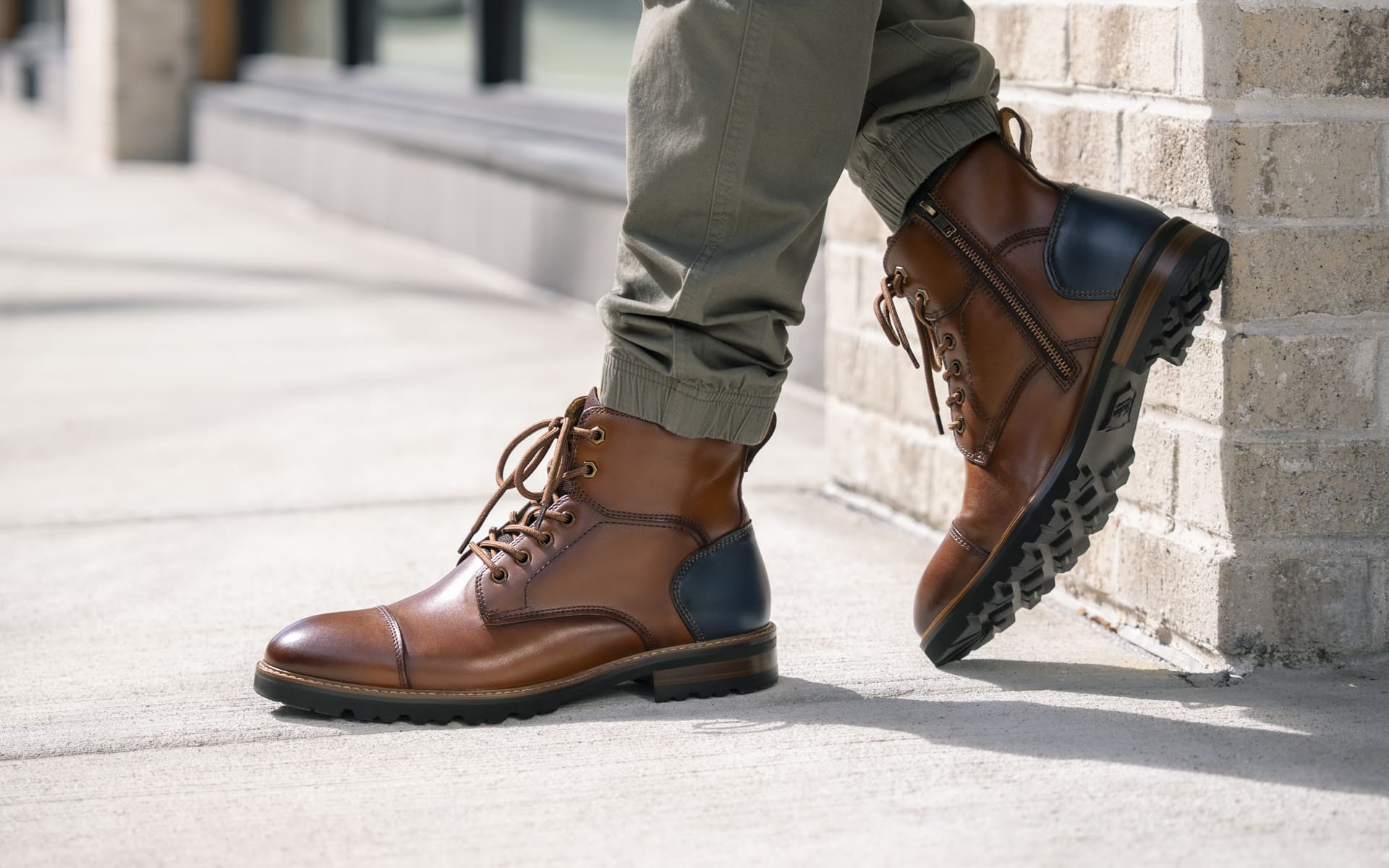 Shop the Renegade collection featuring the cap toe boot in cognac.